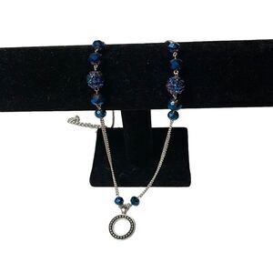 Silver Drop Pendant Necklace With Blue Gem Stones.‎